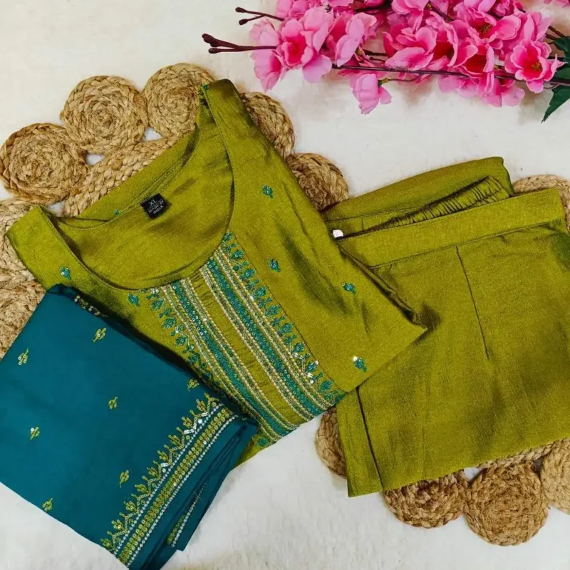 Green embroidered festive suit with embroidered dupatta
