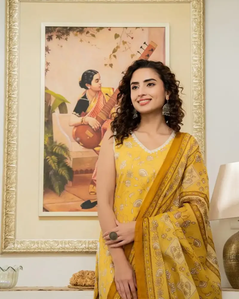 Yellow floral printed straight sleeveless kurti with pant and dupatta